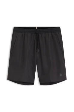 Badeshorts mit kontrastfarbenem Logo und Paspelierung