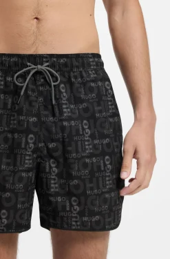 Badeshorts mit saisonalem Print und abgerundetem Saum