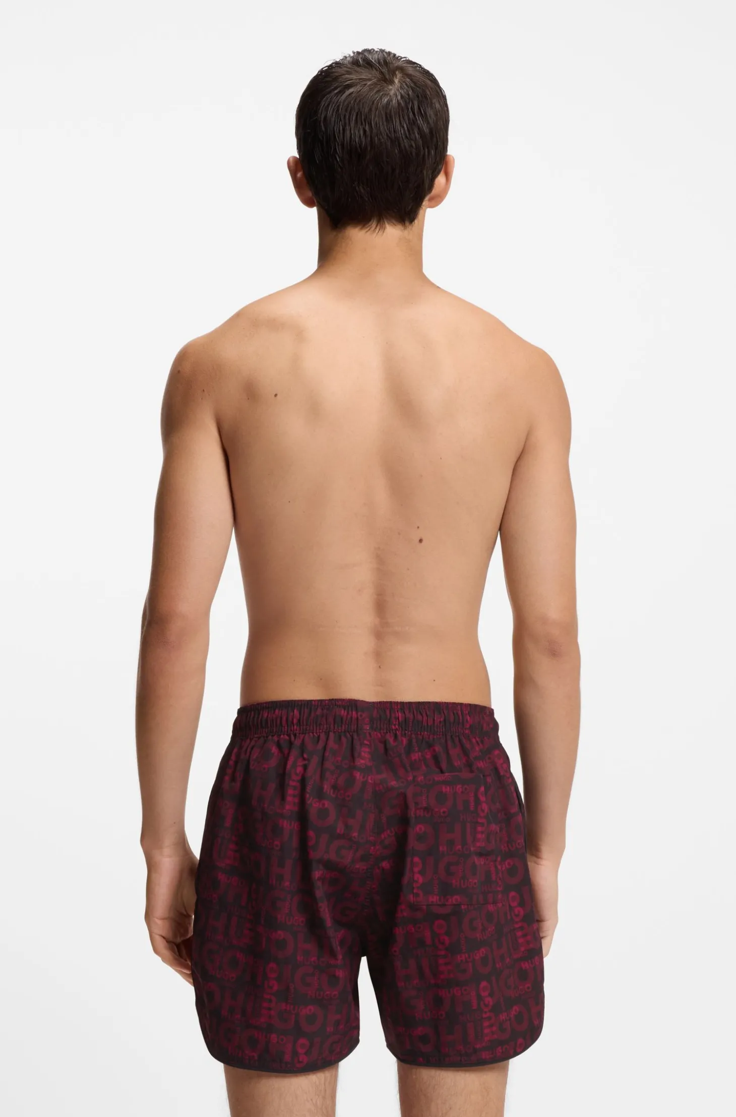 Badeshorts mit saisonalem Print und abgerundetem Saum