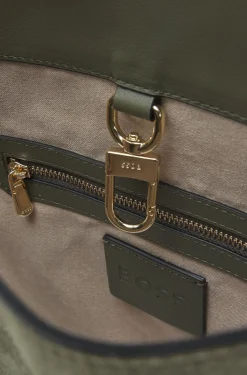BOSS REVERS Beuteltasche aus Veloursleder mit geflochtenem Gurt