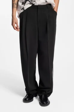 Bundfaltenhose mit Details im Überwendlichstich