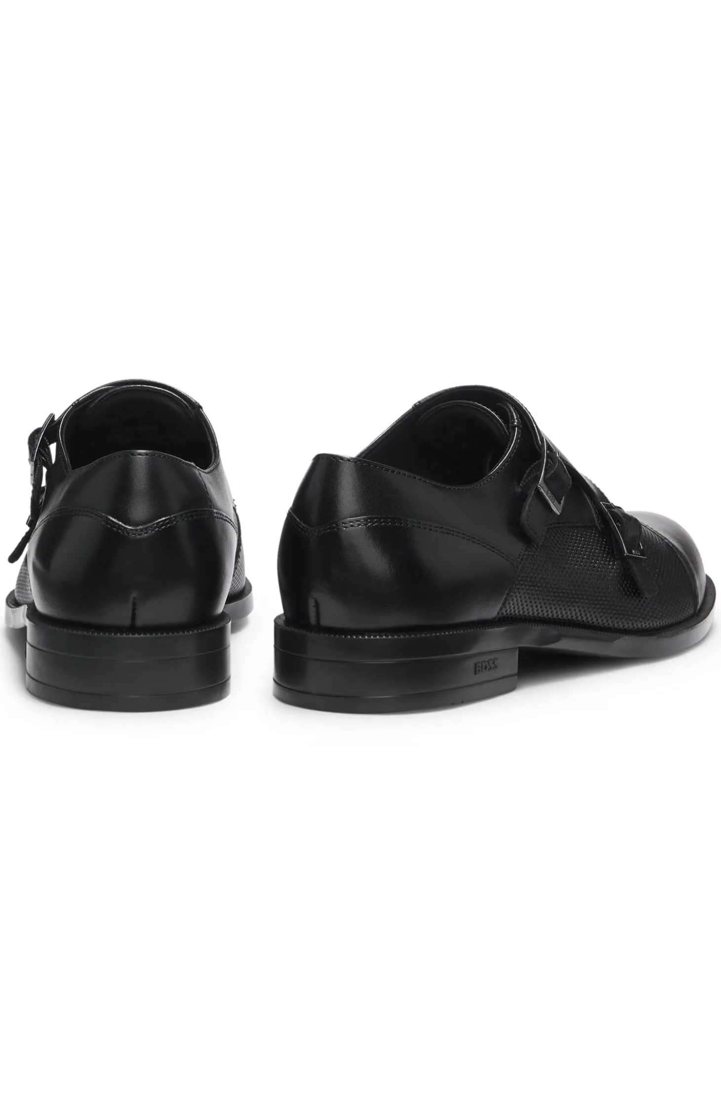 Doppelte Monkstraps aus Leder mit perforiertem Detail