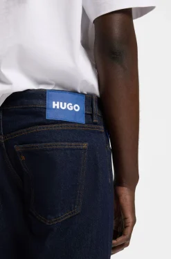 Dunkelblaue Tapered-Fit Jeans aus Stretch-Denim