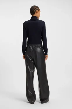 Gestreifte Relaxed-Fit Hose aus Kunstleder mit weitem Beinverlauf