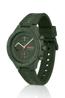 Grüne Uhr mit Logos auf dem Silikonarmband
