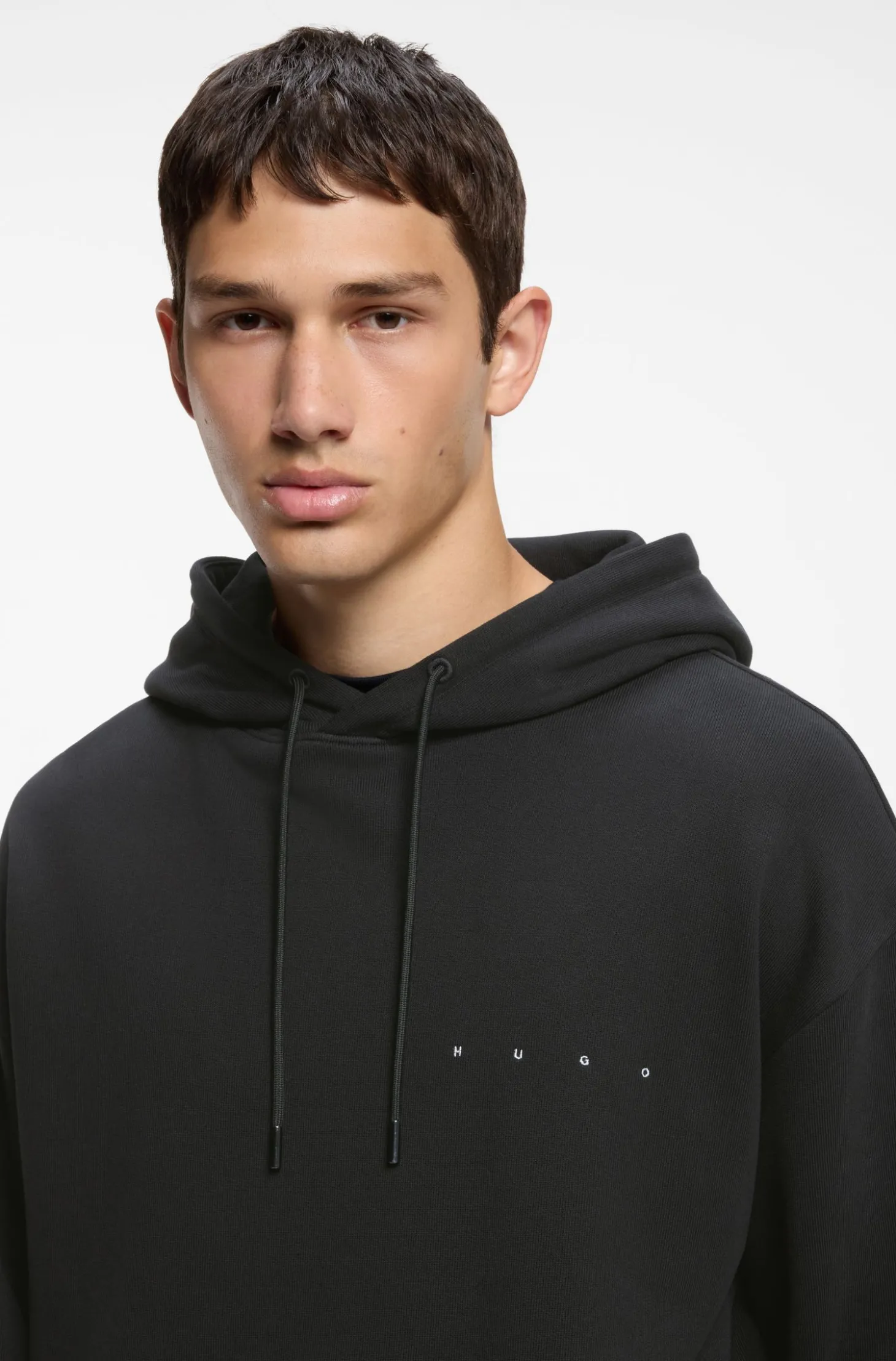 Hoodie aus Baumwolle mit Spaced-Out-Logo und Grafik auf dem Rücken