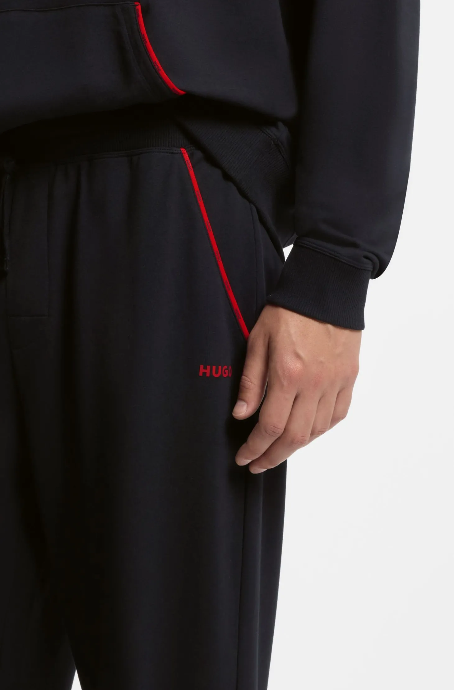 Jogginghose aus Baumwoll-Mix mit Bündchen und Logo-Paspeln