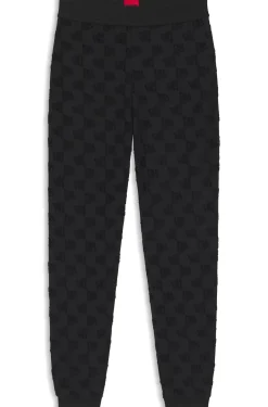 Jogginghose aus Baumwoll-Mix mit Allover-Logo-Muster