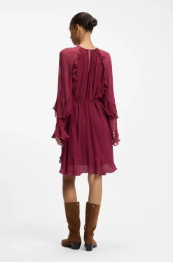 Kleid mit Gürtel und Trichterärmeln