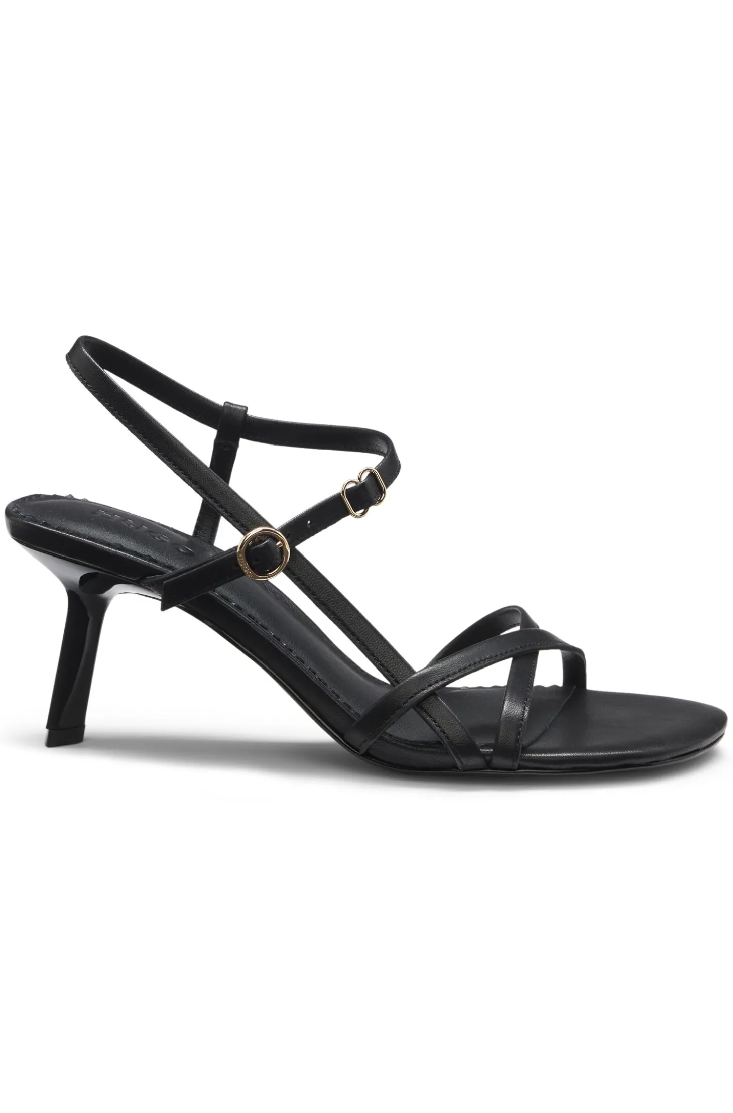 Ledersandalen mit asymmetrischem Absatz und Riemen