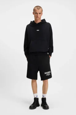 Loose-Fit Hoodie aus Baumwoll-Terry mit Logo-Details