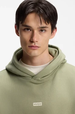 Loose-Fit Hoodie aus Baumwoll-Terry mit Logo-Details