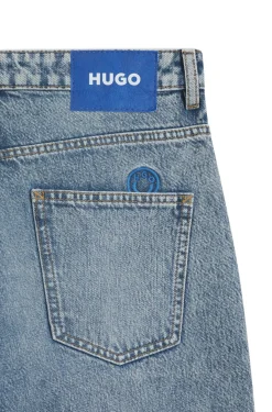 Loose-Fit Jeans aus blauem Denim mit sichtbarem Reißverschluss
