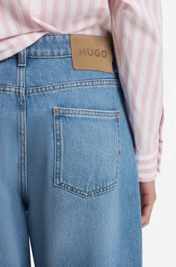 Loose-Fit Jeans mit weitem Bein und Charm-Akzenten
