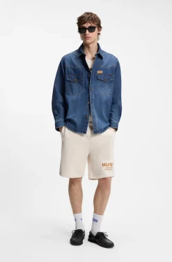 Loose-Fit Shorts aus Baumwoll-Terry mit Logo-Print