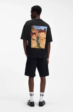 Oversized T-Shirt aus Baumwolle mit Rosen-Grafik im Biker-Stil