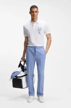 Poloshirt aus Baumwolle in Mesh-Optik mit gesticktem Artwork