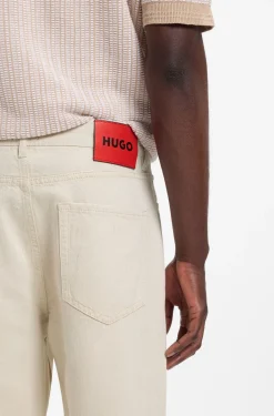 Relaxed Tapered-Fit Jeans aus Denim in Ecru