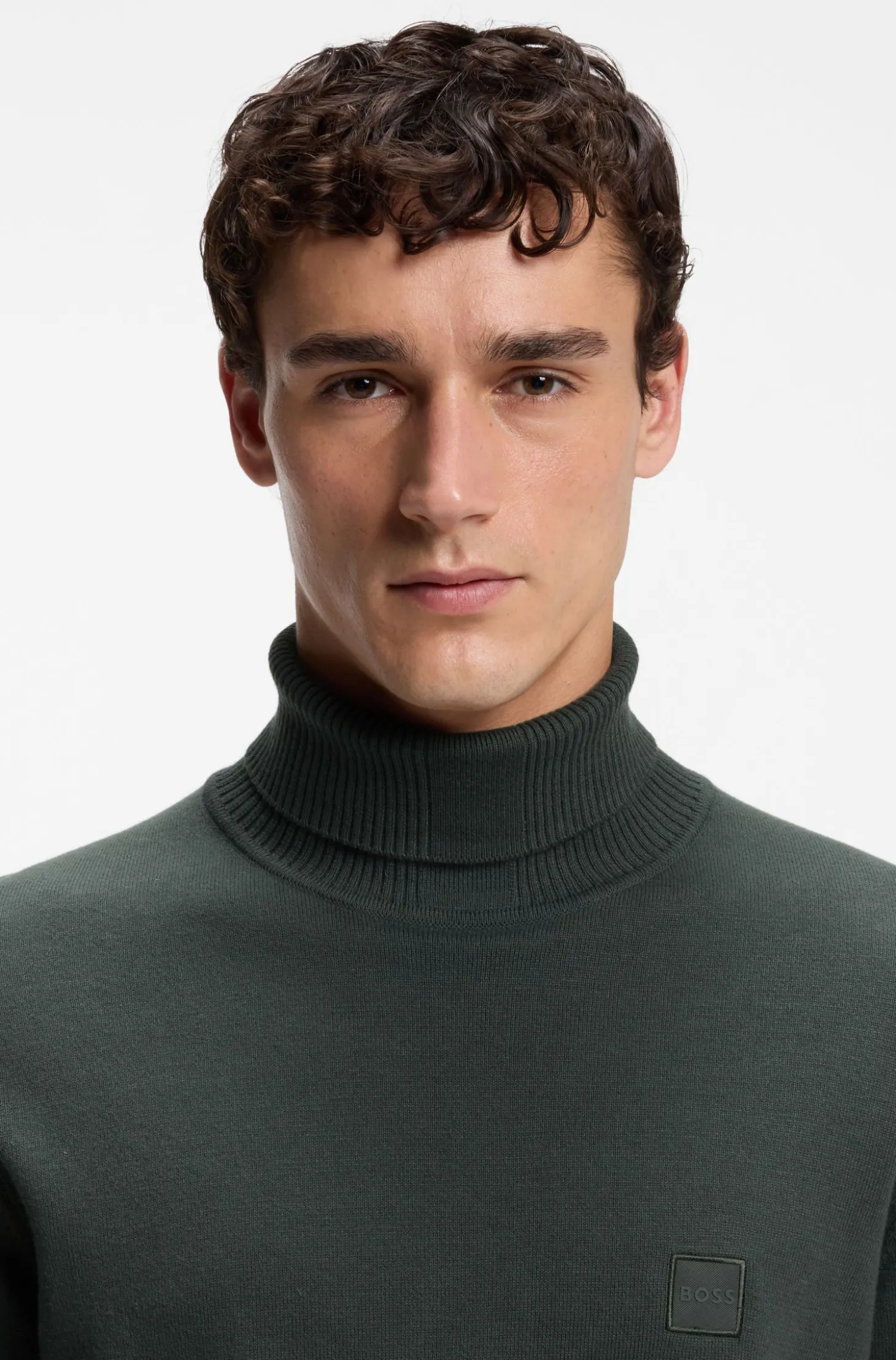 Rollkragenpullover aus Baumwoll-Mix mit Kaschmir und Logo-Aufnäher