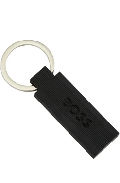 Schlüsselanhänger aus schwarzem Silikon und Messing mit Logo
