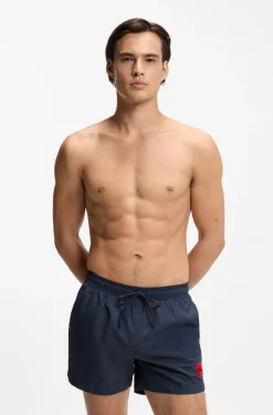 Schnell trocknende Badeshorts mit rotem Logo-Label