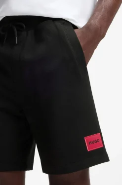 Shorts aus Baumwoll-Terry mit rotem Logo-Label