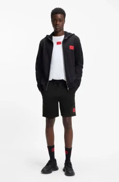 Shorts aus Baumwoll-Terry mit rotem Logo-Label