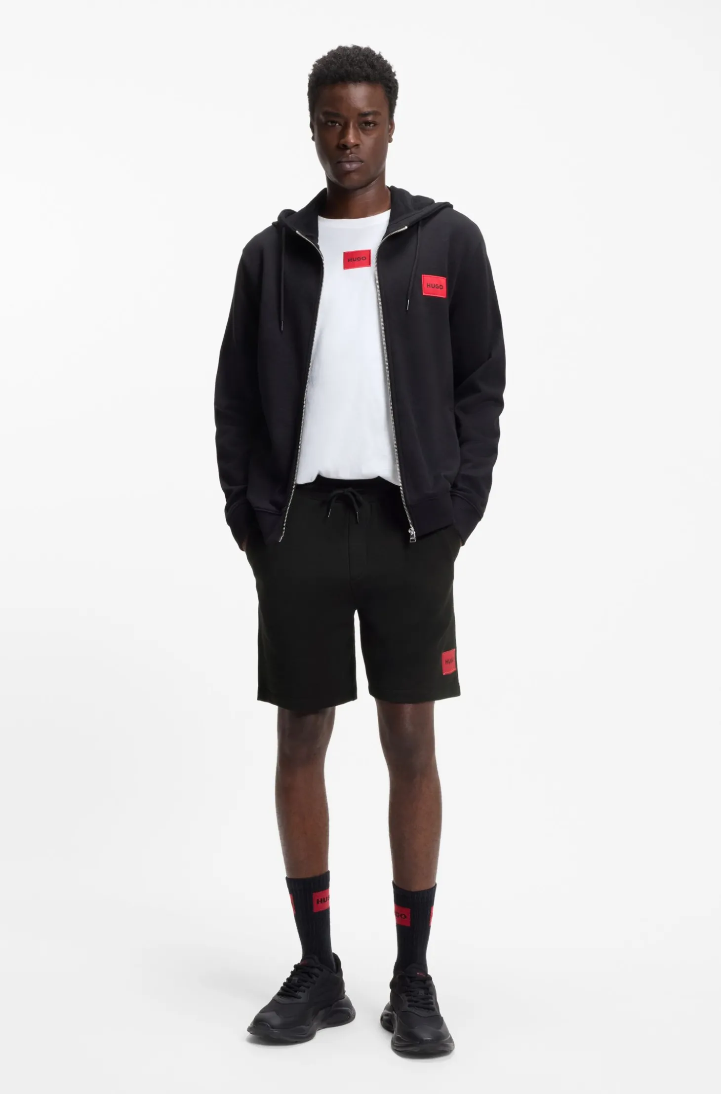 Shorts aus Baumwoll-Terry mit rotem Logo-Label