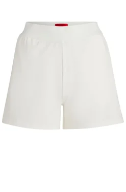 Shorts aus elastischem Gewebe mit Logo-Print