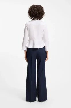Slim-Fit Bluse aus Baumwolle mit Schößchensaum