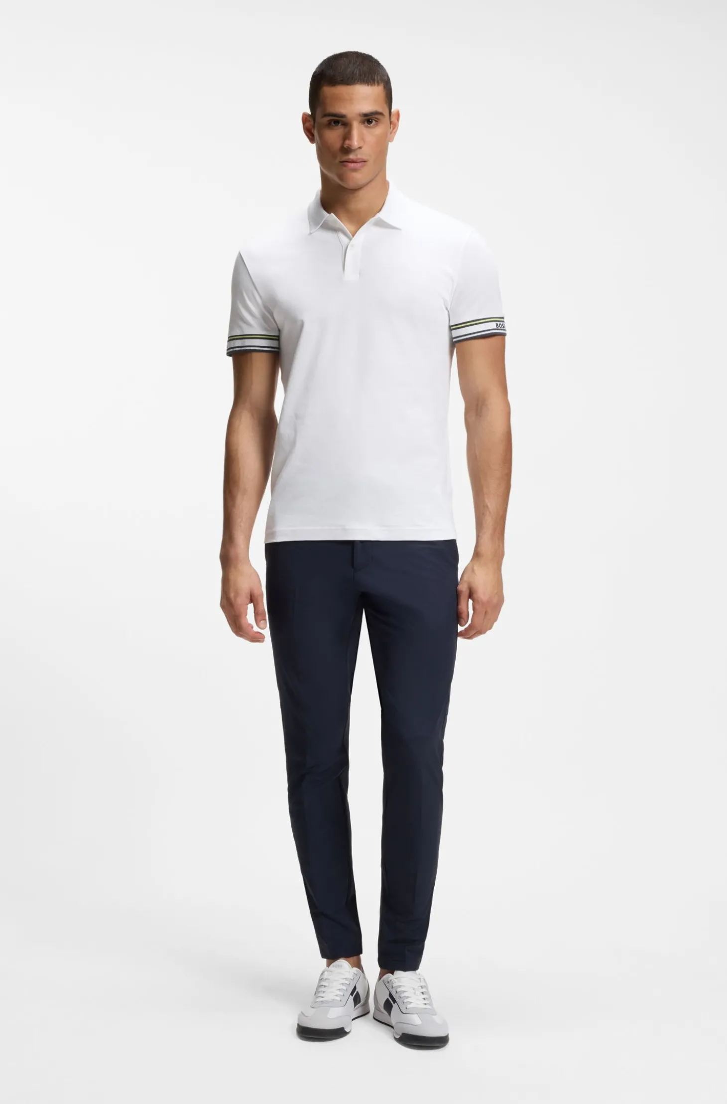 Slim-Fit Poloshirt aus Baumwolle mit gestreiften Ärmelbündchen