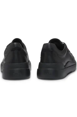 Sneakers aus Leder mit Cupsohle und roten Logo-Details