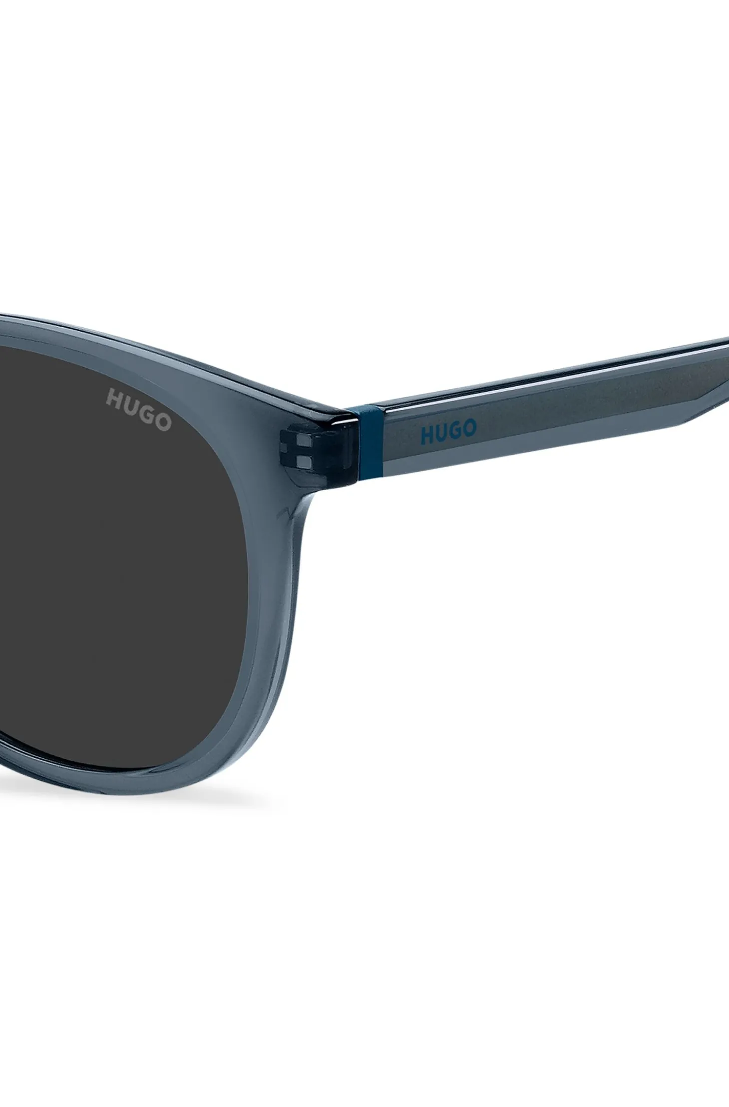 Sonnenbrille aus blauem Acetat mit Gummibesatz