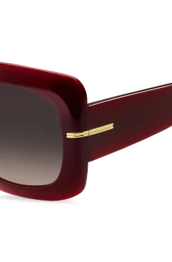 Sonnenbrille aus burgunderrotem Acetat mit goldfarbenen Scharnieren