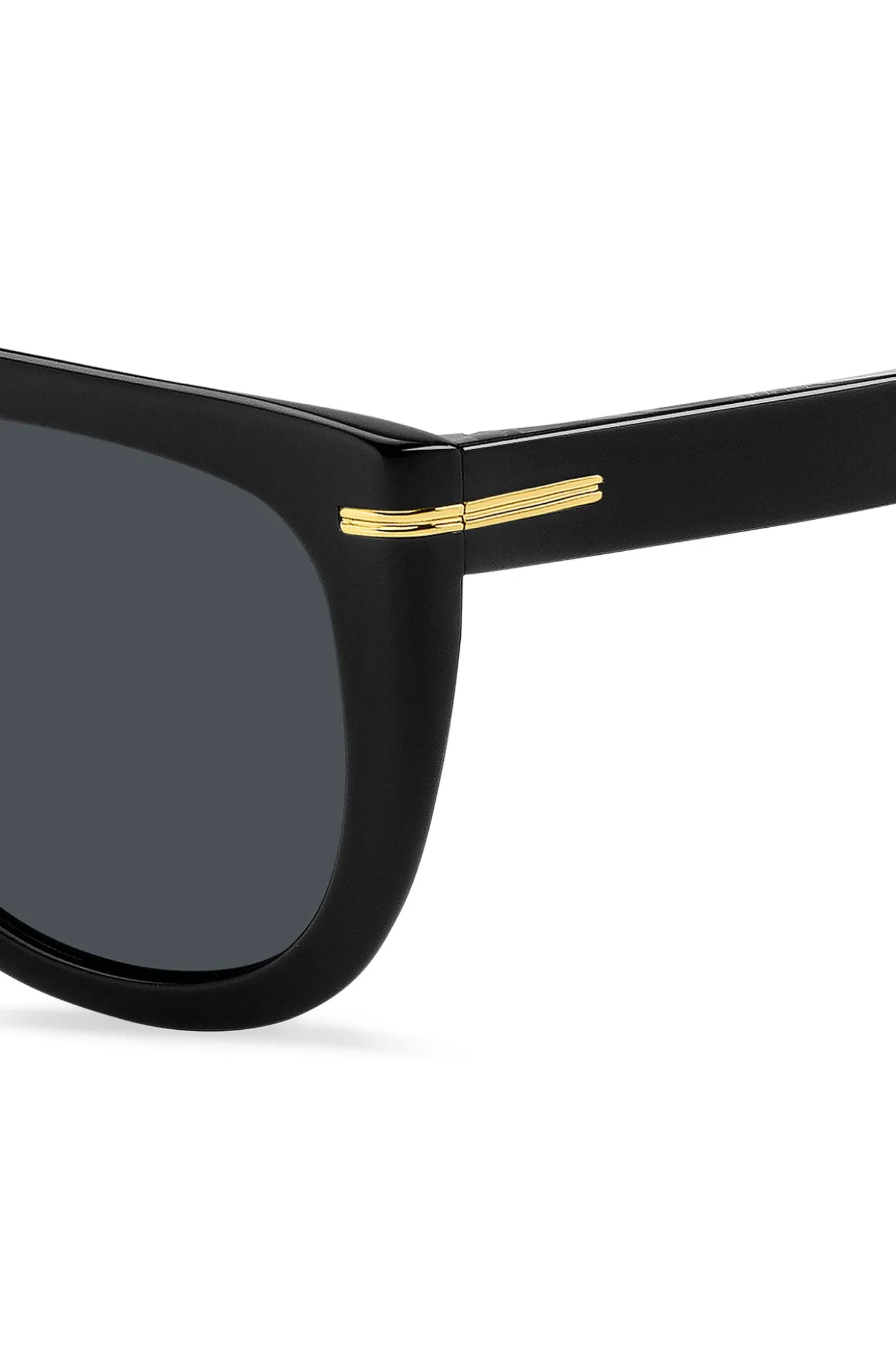 Sonnenbrille aus schwarzem Acetat mit goldfarbenen Metalldetails