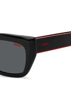 Sonnenbrille aus schwarzem Acetat mit mehrlagigen Bügeln in Signature-Rot