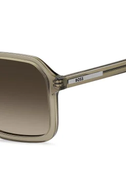 Sonnenbrille in transparentem Braun mit Logo-Details