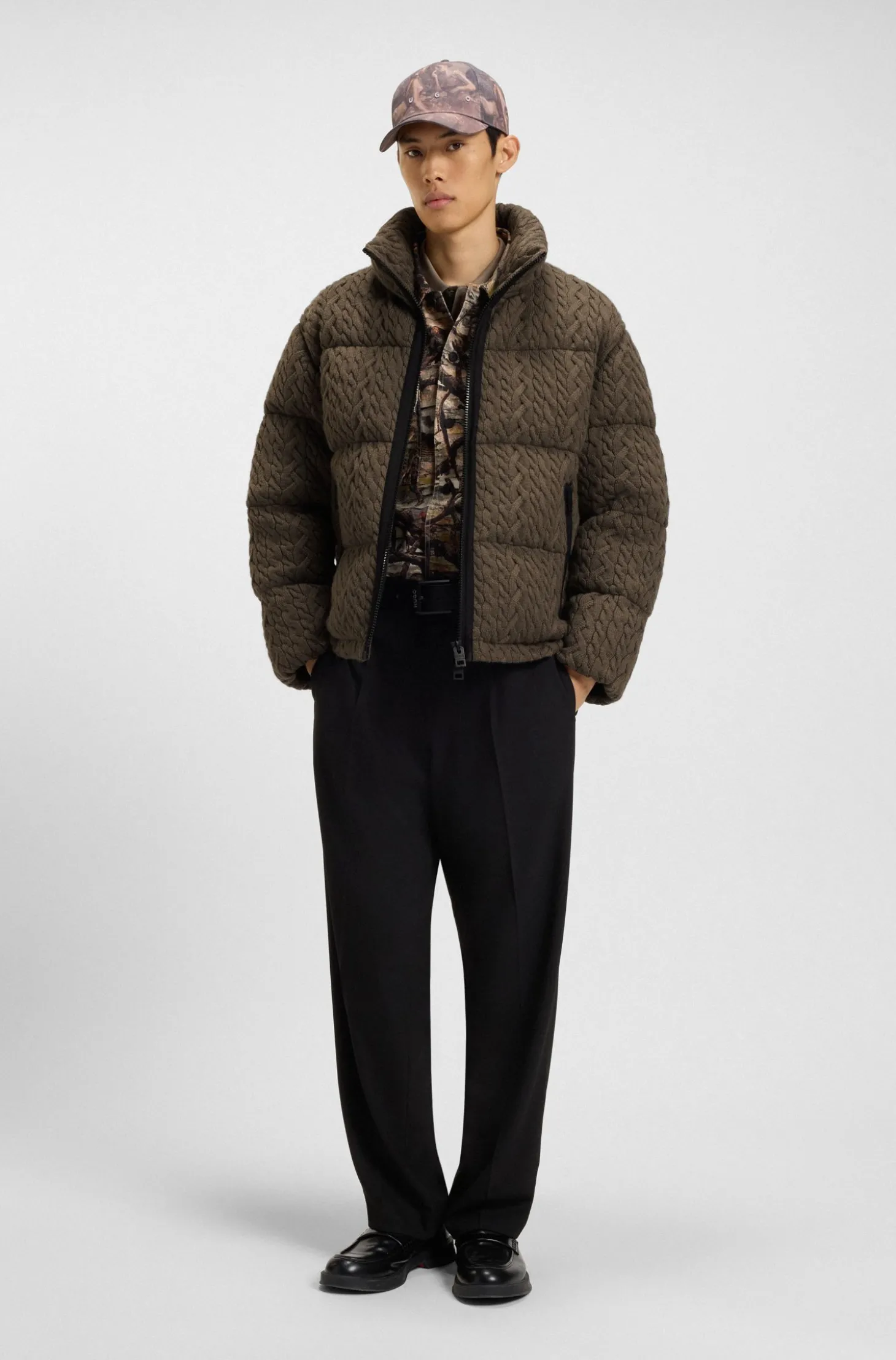 Steppjacke mit Zopfmuster-Struktur