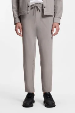 Tapered-Fit Hose aus Stretch-Gewebe mit Waffelstruktur