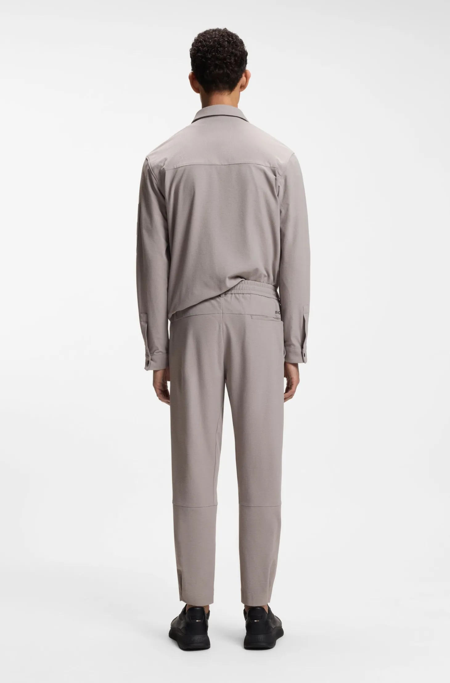 Tapered-Fit Hose aus Stretch-Gewebe mit Waffelstruktur