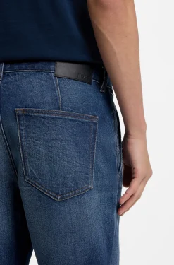 Tapered-Fit Jeans aus bequemem Stretch-Denim mit Used-Effekt
