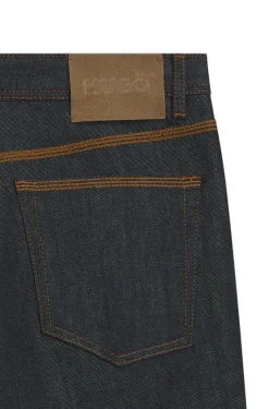 Tapered-Fit Jeans aus dunkelblauem ungewaschenem Denim