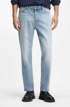 Tapered-Fit Jeans aus hellblauem, elastischem Denim