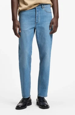Tapered-Fit Jeans aus hellblauem, elastischem Denim