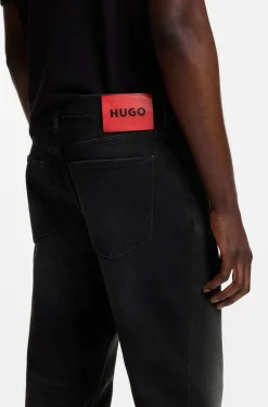 Tapered-Fit Jeans aus schwarzem Stretch-Denim