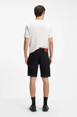 Tapered-Fit Shorts aus schwarzem Stretch-Denim