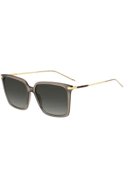 Transparent-braune Sonnenbrille mit goldfarbenen Details