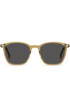 Transparente, beigefarbene Sonnenbrille mit grauen Gläsern