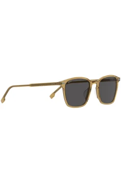 Transparente, beigefarbene Sonnenbrille mit grauen Gläsern