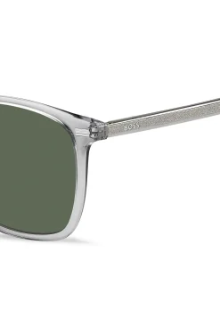 Transparent-graue Sonnenbrille mit Logo an den Bügeln